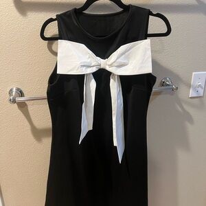 Elegant Black Dress with White Bow